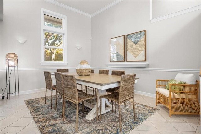 449 S Garcon Point Rd Fl, Milton, FL 32583 - dining space with light tile patterned flooring and crown molding