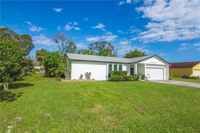 ranch-style house with a front lawn and a garage