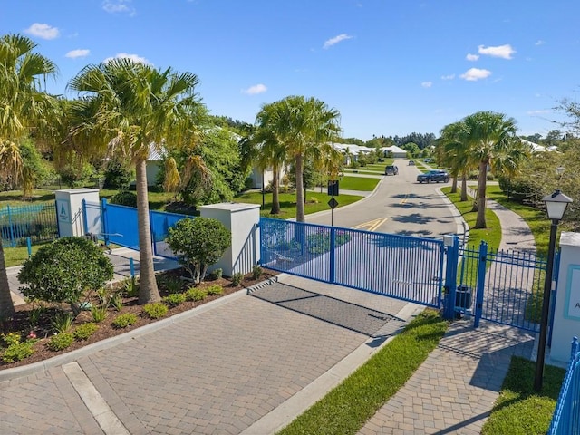 view of gate featuring fence