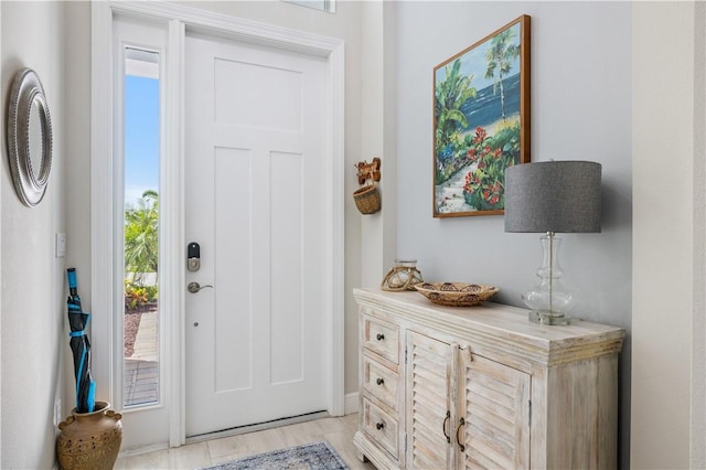 foyer with light wood-style flooring