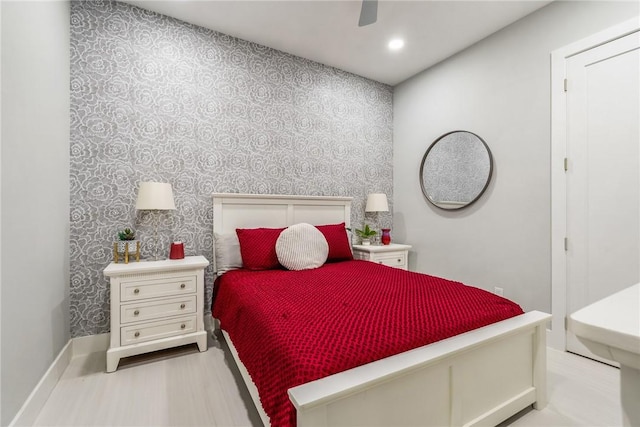 bedroom with recessed lighting, wallpapered walls, baseboards, and a ceiling fan