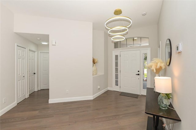 590 Valencia Cir SW, Vero Beach, FL 32968 - foyer featuring wood finished floors and baseboards