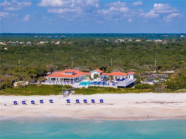 aerial view featuring a view of the beach and a water view