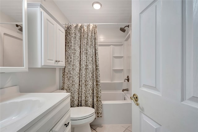 full bathroom with tile patterned flooring, vanity, toilet, and shower / bath combo with shower curtain