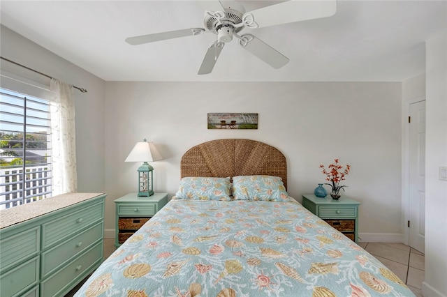 bedroom featuring ceiling fan and light tile patterned floors