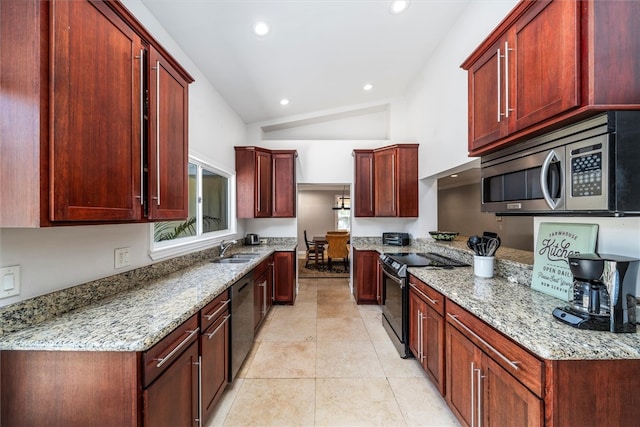 kitchen featuring stainless steel appliances, light tile patterned flooring, sink, light stone countertops, and lofted ceiling