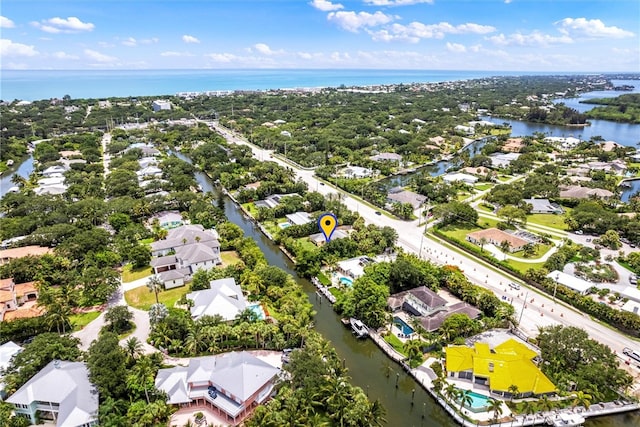 drone / aerial view featuring a water view