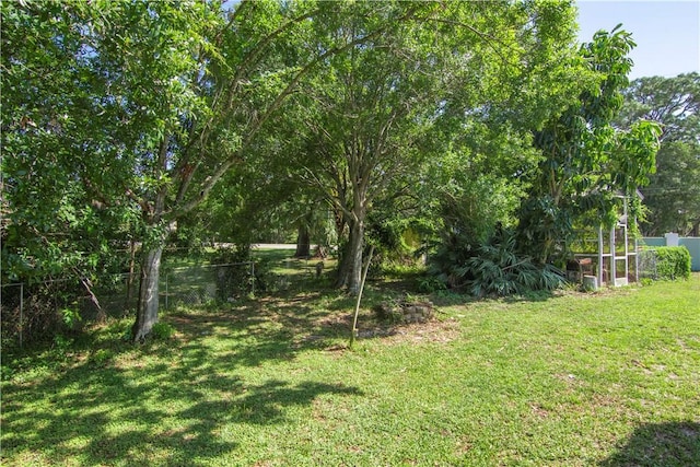 view of yard with fence