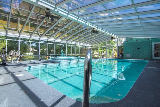 indoor pool with a patio and a lanai