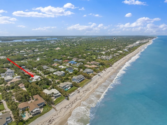 bird's eye view with a beach view and a water view