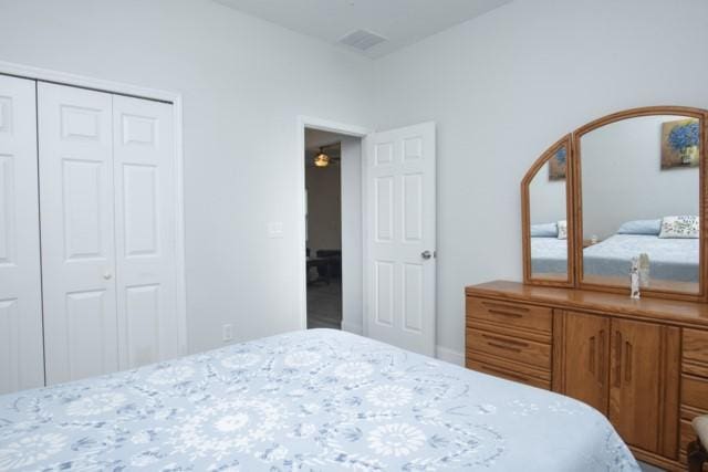 8286 96th Ct, Vero Beach, FL 32967 - bedroom featuring a closet