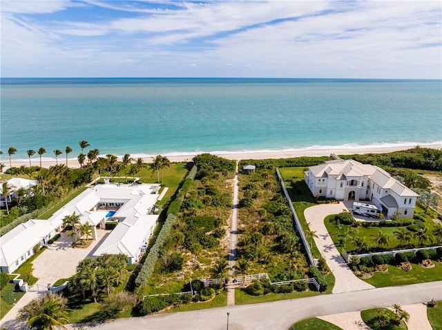 bird's eye view with a beach view and a water view