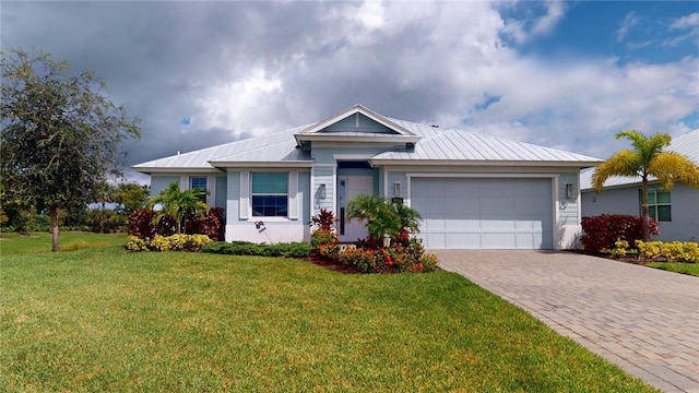 ranch-style house featuring a front yard and a garage