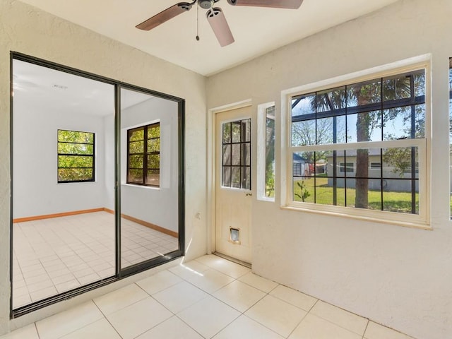 1626 4th Ct, Vero Beach, FL 32960 - empty room with ceiling fan and tile patterned floors