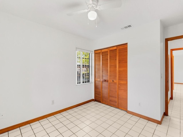 1626 4th Ct, Vero Beach, FL 32960 - unfurnished bedroom with a closet and a ceiling fan