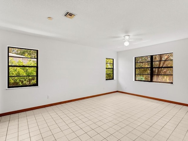 1626 4th Ct, Vero Beach, FL 32960 - unfurnished room featuring ceiling fan and baseboards