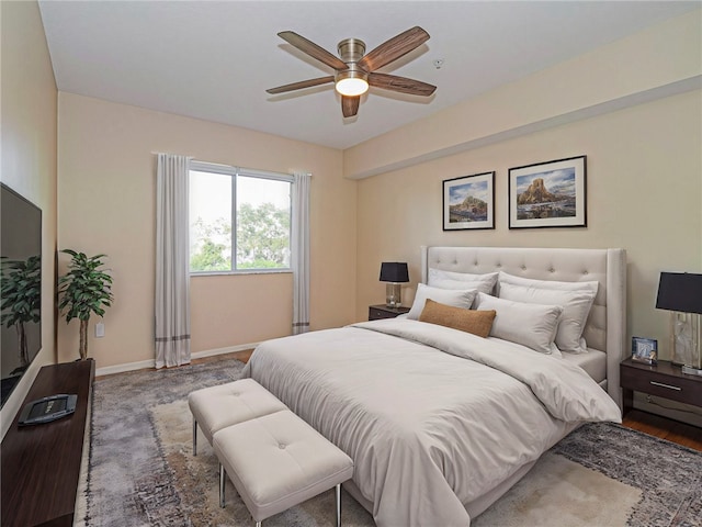 bedroom featuring ceiling fan and wood-type flooring