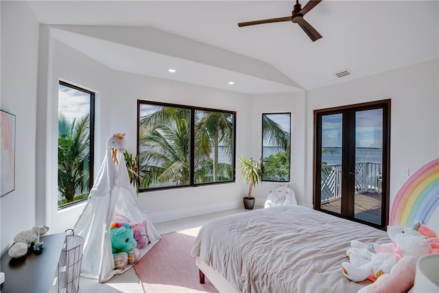 bedroom featuring vaulted ceiling, ceiling fan, french doors, multiple windows, and access to outside