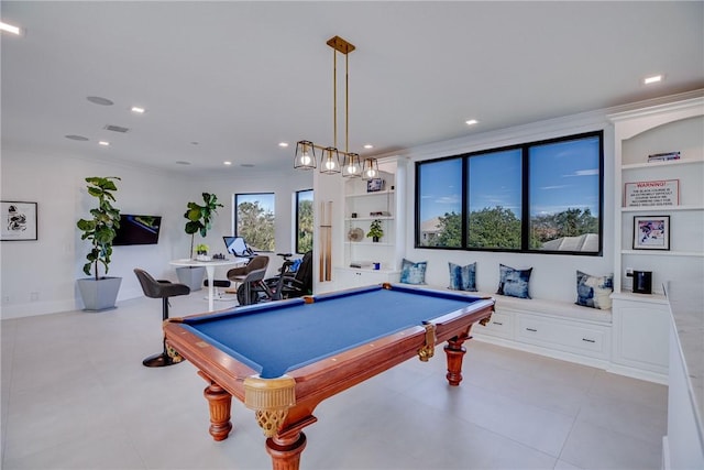 rec room with pool table, crown molding, plenty of natural light, and built in shelves