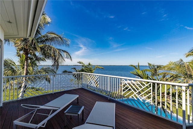 wooden terrace with a water view