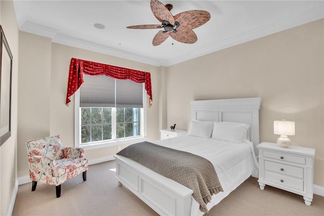 bedroom featuring ornamental molding, light carpet, baseboards, and a ceiling fan