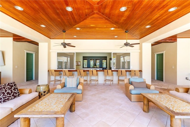 living room featuring lofted ceiling, wooden ceiling, and recessed lighting