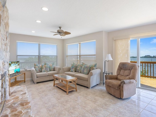 8820 44th Ave, Sebastian, FL 32958 - living room with ceiling fan, light tile patterned floors, and recessed lighting