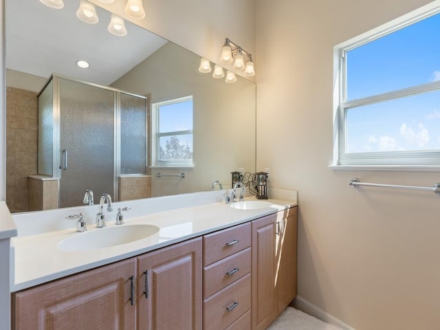 8820 44th Ave, Sebastian, FL 32958 - full bathroom with double vanity, a stall shower, and recessed lighting
