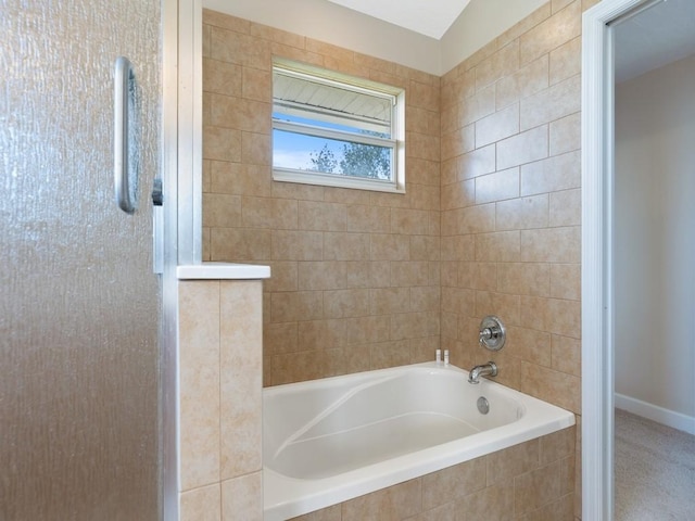 8820 44th Ave, Sebastian, FL 32958 - bathroom with tiled tub and a shower