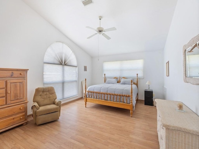8820 44th Ave, Sebastian, FL 32958 - bedroom featuring vaulted ceiling, light wood-type flooring, and a ceiling fan