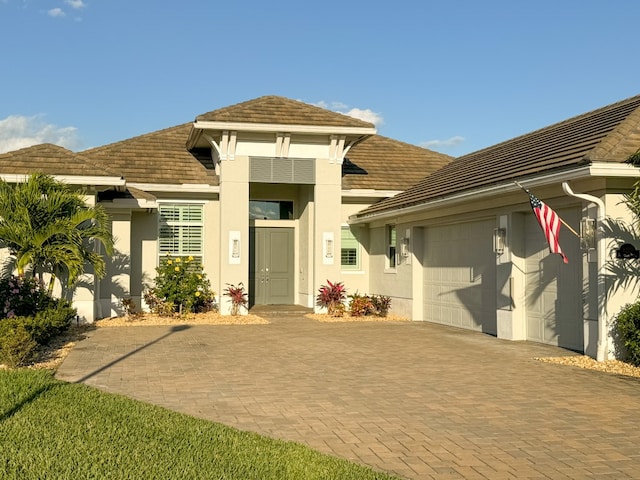 view of front of property featuring a garage