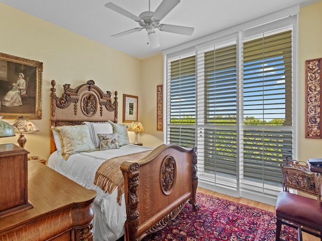 bedroom featuring wood finished floors and ceiling fan