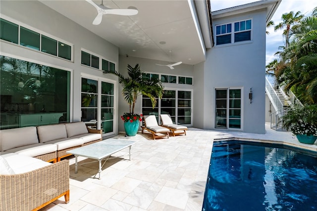 exterior space with a patio, outdoor lounge area, and ceiling fan