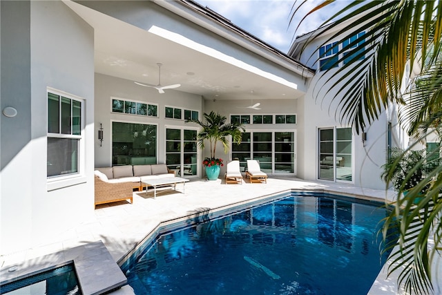 view of pool featuring outdoor lounge area, ceiling fan, and a patio