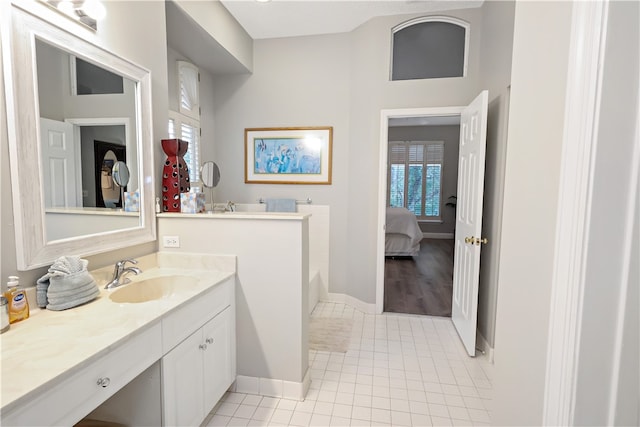 bathroom featuring vanity and tile patterned flooring