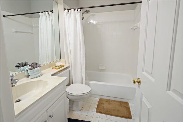 full bathroom featuring toilet, vanity, shower / bath combination with curtain, and tile patterned floors