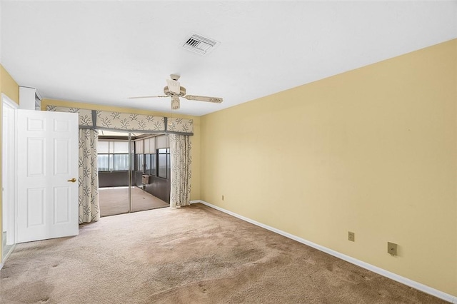 723 Timber Ridge Trl SW Unit B, Vero Beach, FL 32962 - unfurnished bedroom featuring carpet and ceiling fan