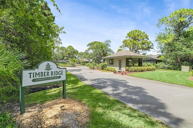723 Timber Ridge Trl SW Unit B, Vero Beach, FL 32962 - community / neighborhood sign with a yard