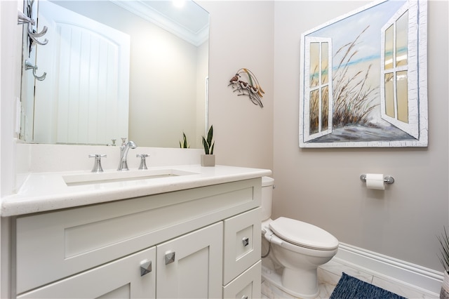 bathroom with crown molding, tile patterned flooring, vanity, and toilet