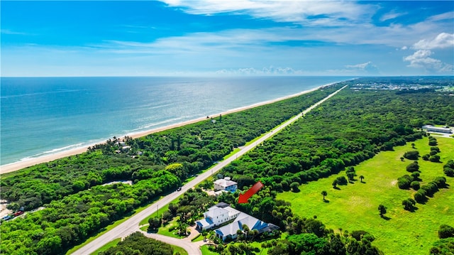 drone / aerial view with a view of the beach and a water view