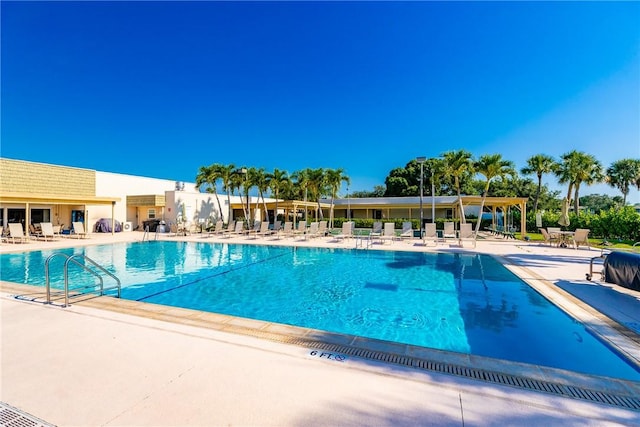 community pool featuring a patio area