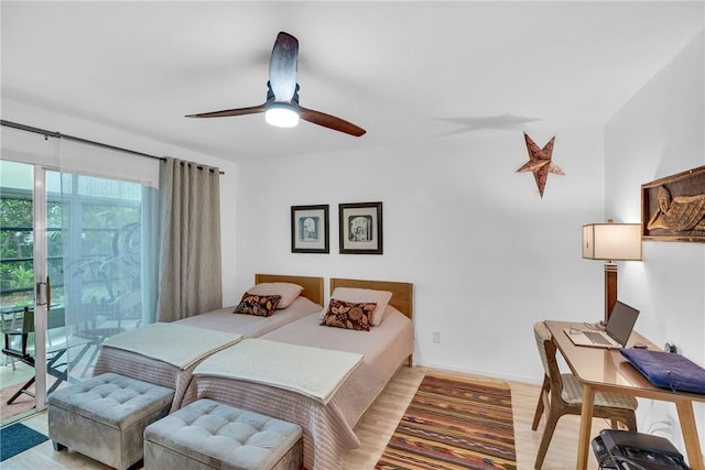 bedroom with light wood-style floors, ceiling fan, baseboards, and access to outside