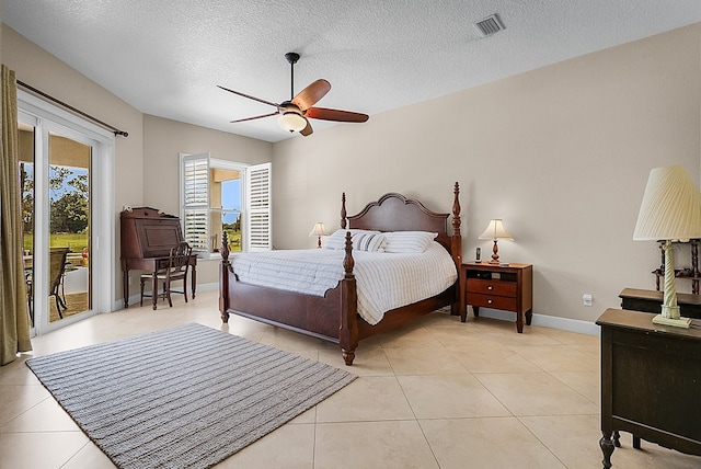 bedroom featuring a textured ceiling, access to outside, ceiling fan, and light tile patterned flooring