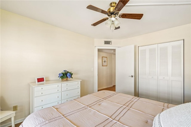 bedroom featuring a closet and ceiling fan