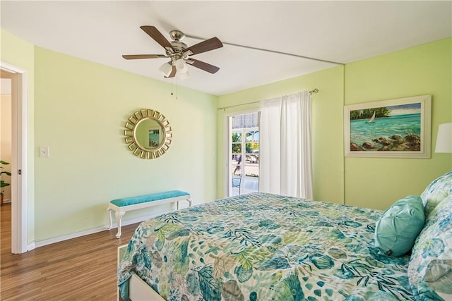 bedroom with ceiling fan and wood-type flooring