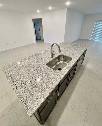 450 Hazel St, Sebastian, FL 32958 - kitchen featuring open floor plan, recessed lighting, and light stone countertops