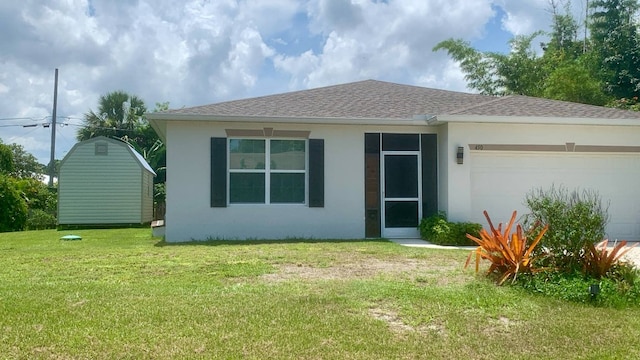 450 Hazel St, Sebastian, FL 32958 - single story home featuring stucco siding, a front yard, an attached garage, and roof with shingles