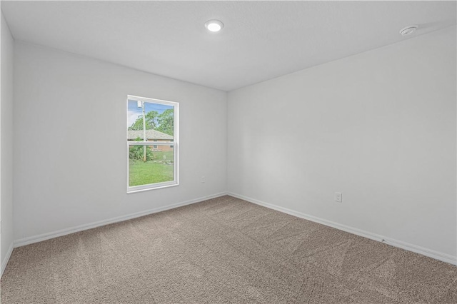 8175 104th Ave, Vero Beach, FL 32967 - carpeted spare room with baseboards
