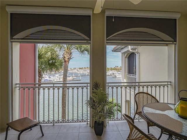 balcony featuring a water view