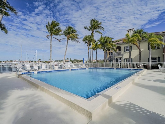 view of swimming pool with a patio area